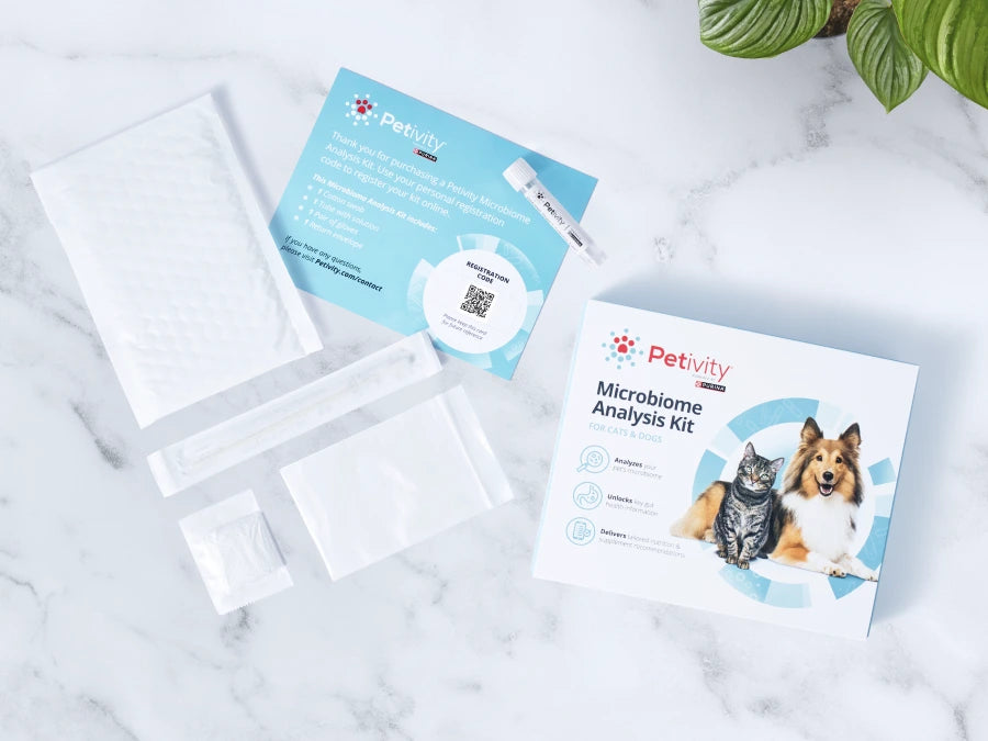 Petivity Microbiome Analysis Kit with collection tools and box featuring a cat and dog for at-home gut health testing.