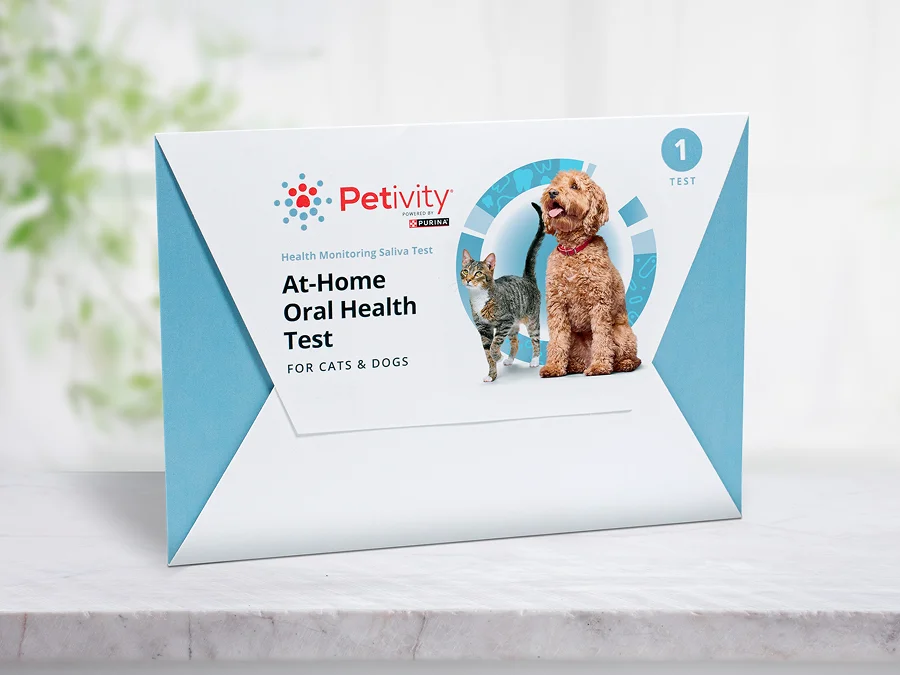 Petivity At-Home Oral Health Test for cats and dogs with packaging featuring a dog and cat on a light background